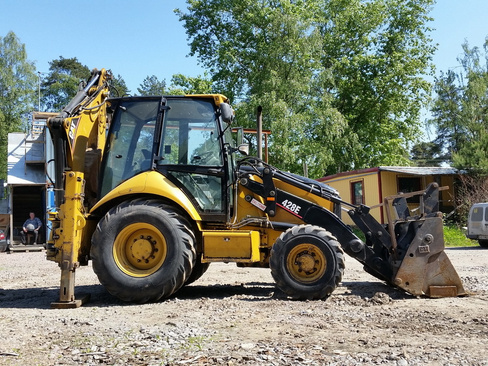 Аренда экскаватора погрузчика CATERPILLAR 428E